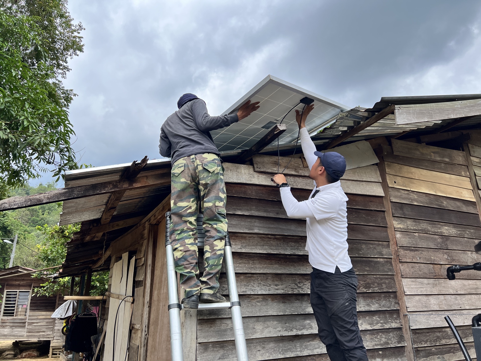 Battery storage and solar inverter system installed inside a community building, providing reliable off-grid electricity